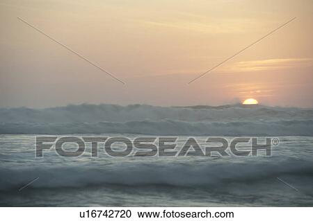 Stock Image - Sunset seascape in San Jose Costa Rica. Fotosearch