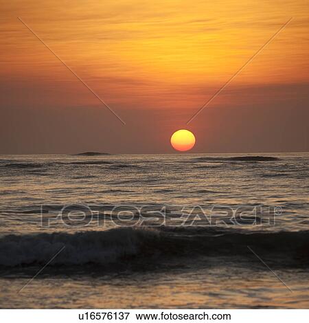 Stock Photo - Sunset sky over Costa Rica. Fotosearch