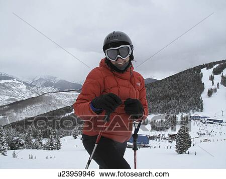 Stock Photograph - Teenage girl skiing in Vail, Colorado. Fotosearch