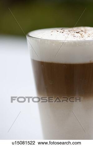 Three layer frothy coffee in a glass mug View Large Photo Image Stock Image - Three layer frothy coffee in a glass mug. Fotosearch