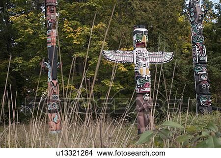 Picture - Totem Poles in Stanley Park in Vancouver, British Columbia, Canada. Fotosearch