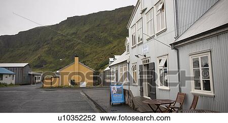 Stock Image - Town street and buildings on mountainside. Fotosearch
