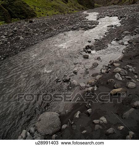 Water runoff in rocky riverbed View Large Photo Image Stock Image - Water runoff in rocky riverbed. Fotosearch