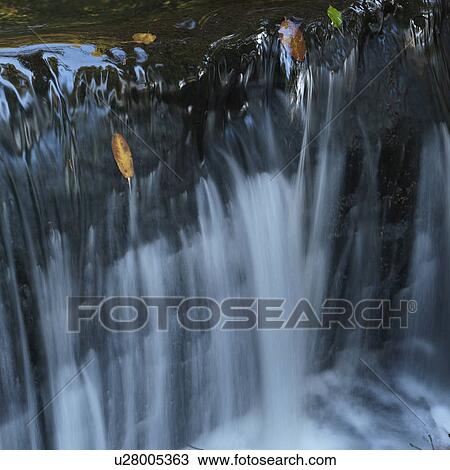Stock Image - Waterfall in Stanley park in Vancouver, British Columbia, Canada. Fotosearch