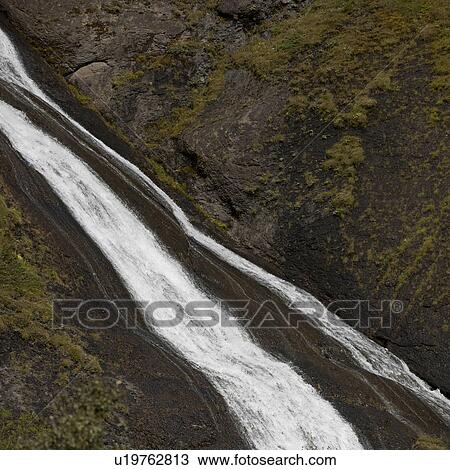 Waterfall on lichen covered mountain View Large Photo Image Stock Image - Waterfall on lichen covered mountain. Fotosearch