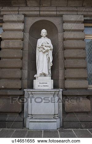 Stock Photography - White marble statue of Pedro Calderon de la Barca on a pedestal in a niche. Fotosearch