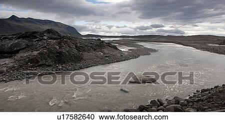 Stock Image - White water river running through rocky riverbed, . Fotosearch