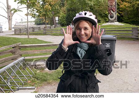 Picture - Woman making an expression with her face in Vancouver, British Columbia, Canada. Fotosearch
