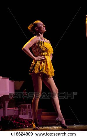 Stock Photo - Woman performing at the Moon River Theatre in Branson, Missouri. Fotosearch