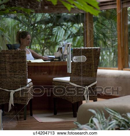 Woman working at her desk in Costa Rica View Large Photo Image Stock Image - Woman working at her desk in Costa Rica. Fotosearch