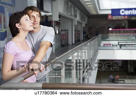 Young couple in shopping centre, Voronezh View Large Photo Image Picture - Young couple in shopping centre, Voronezh. Fotosearch