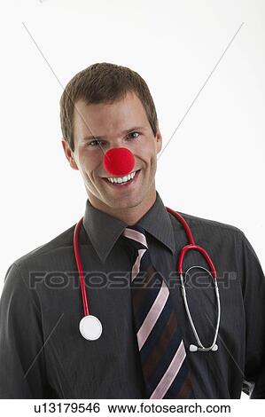 Doctor with stethoscope and clown's nose View Large Photo Image Stock Photograph - Doctor with stethoscope and clown's nose. Fotosearch