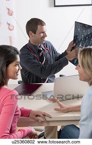 Stock Image - Doctor's visit . Fotosearch