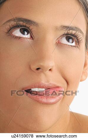 Female young adult face; tongue out View Large Photo Image Stock Photo - Female young adult face; tongue out. Fotosearch