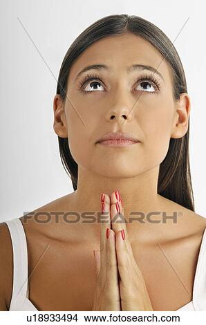 Female young adult; hands together; praying View Large Photo Image Picture - Female young adult; hands together; praying. Fotosearch