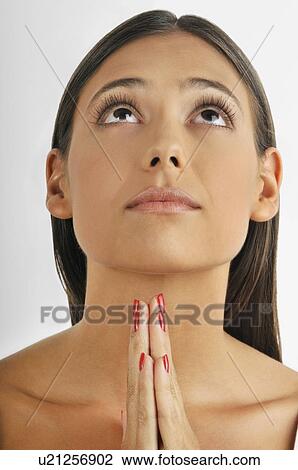 Female young adult; hands together; praying View Large Photo Image Stock Image - Female young adult; hands together; praying. Fotosearch