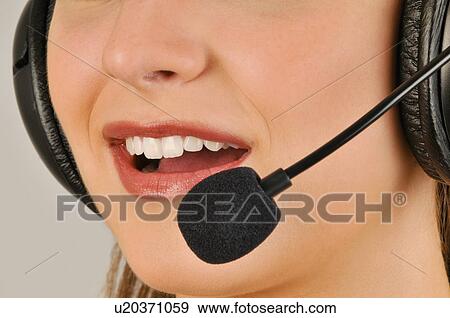 Female young adult mouth with microphone headset View Large Photo Image Stock Photo - Female young adult mouth with microphone headset. Fotosearch
