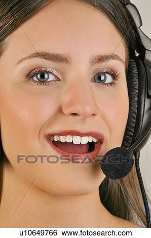 Female young adult with microphone headset View Large Photo Image Stock Photograph - Female young adult with microphone headset. Fotosearch