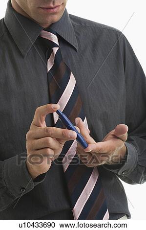 Man holding blood sugar test View Large Photo Image Stock Image - Man holding blood sugar test. Fotosearch