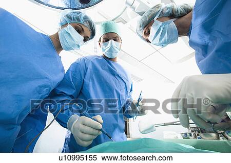 Medical personnel in operating room View Large Photo Image Stock Photography - Medical personnel in operating room. Fotosearch