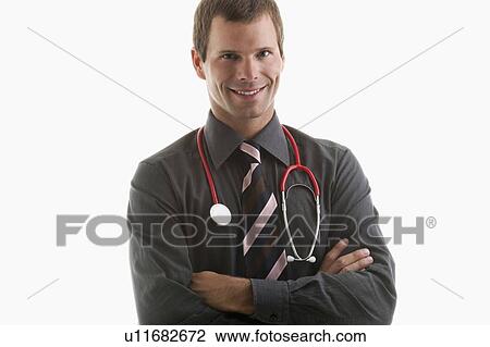 Portrait of a doctor wearing stethoscope View Large Photo Image Stock Image - Portrait of a doctor wearing stethoscope. Fotosearch
