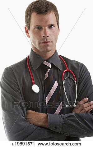 Portrait of a doctor wearing stethoscope View Large Photo Image Stock Image - Portrait of a doctor wearing stethoscope. Fotosearch