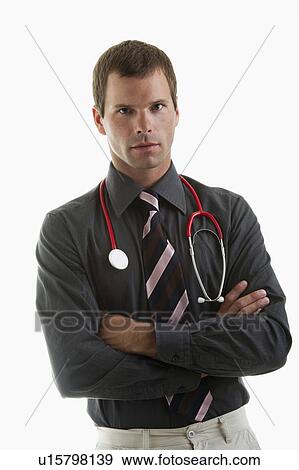 Stock Photo - Portrait of a doctor wearing stethoscope. Fotosearch