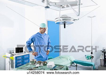 Picture - Surgeon in operating room. Fotosearch