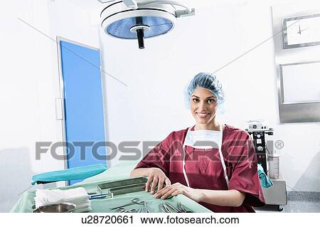 Surgeon in operating room View Large Photo Image Stock Image - Surgeon in operating room. Fotosearch