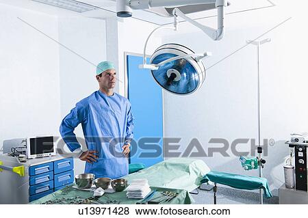 Stock Photo - Surgeon in operating room. Fotosearch