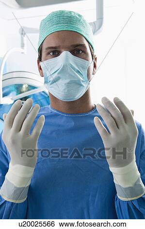 Surgeon in operating room View Large Photo Image Stock Photograph - Surgeon in operating room. Fotosearch