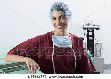 Stock Photography - Surgeon in operating room. Fotosearch