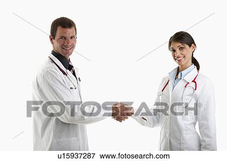 Stock Photo - Two doctors shaking hands. Fotosearch