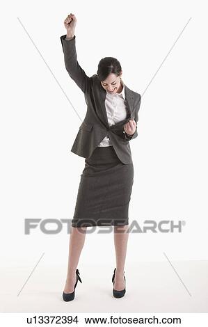 Woman holding fist up View Large Photo Image Picture - Woman holding fist up. Fotosearch
