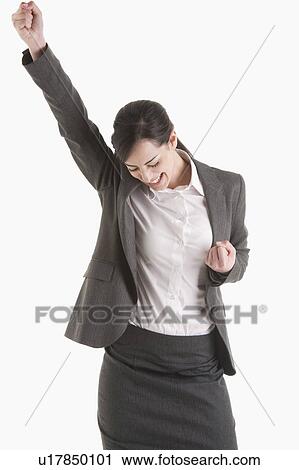 Stock Image - Woman holding fist up. Fotosearch