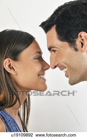 Young adult couple touching noses View Large Photo Image Stock Image - Young adult couple touching noses. Fotosearch