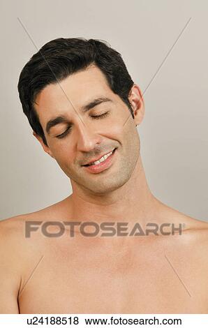 Young male adult face; eyes closed View Large Photo Image Stock Photo - Young male adult face; eyes closed. Fotosearch