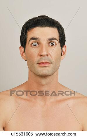 Stock Photography - Young male adult staring. Fotosearch
