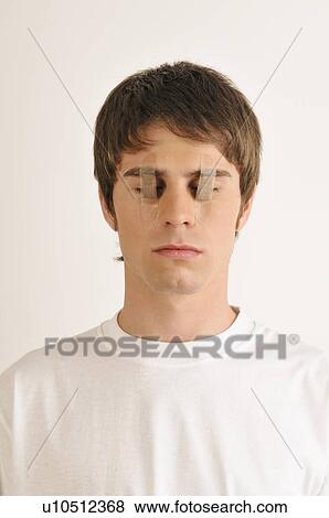 Young male adult with Band-Aids over his eyes View Large Photo Image Stock Photo - Young male adult with Band-Aids over his eyes. Fotosearch