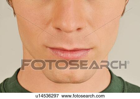Young male adult's mouth and nose close up View Large Photo Image Stock Photo - Young male adult's mouth and nose close up. Fotosearch