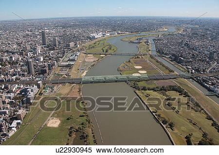 Stock Photography - Aerial view of Arakawa river, Kawaguchi City, Saitama Prefecture, Honshu, Japan. Fotosearch
