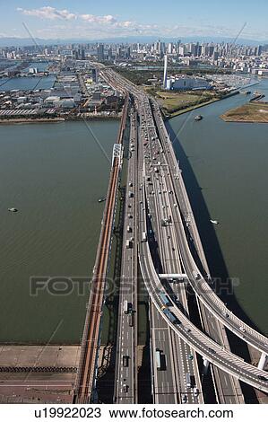 Aerial view of bridge over Tokyo bay, Edogawa ward, Tokyo Prefecture, Honshu, Japan View Large Photo Image Stock Image - Aerial view of bridge over Tokyo bay, Edogawa ward, Tokyo Prefecture, Honshu, Japan. Fotosearch