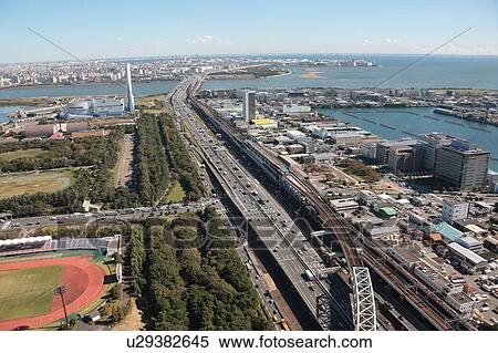 Aerial view of bridge over Tokyo bay, Koto ward, Tokyo Prefecture, Honshu, Japan View Large Photo Image Stock Photography - Aerial view of bridge over Tokyo bay, Koto ward, Tokyo Prefecture, Honshu, Japan. Fotosearch
