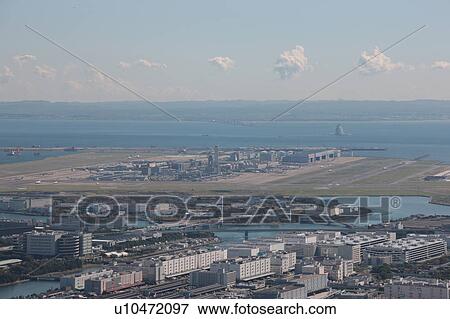 Stock Photo - Aerial view of Haneda airport, Shinagawa ward, Tokyo Prefecture, Honshu, Japan. Fotosearch
