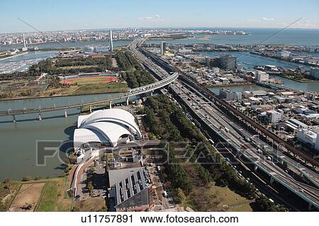 Stock Image - Aerial view of highway by Tokyo bay, Koto ward, Tokyo Prefecture, Honshu, Japan. Fotosearch