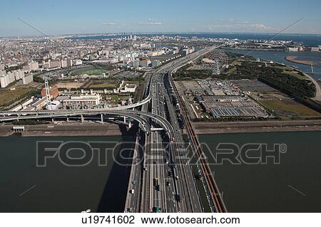 Aerial view of highway over Arakawa river, Edogawa ward, Tokyo Prefecture, Honshu, Japan View Large Photo Image Stock Image - Aerial view of highway over Arakawa river, Edogawa ward, Tokyo Prefecture, Honshu, Japan. Fotosearch