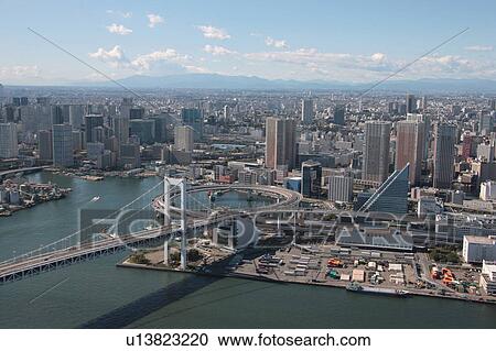 Stock Image - Aerial view of Rainbow bridge, Minato ward, Tokyo Prefecture, Honshu, Japan. Fotosearch