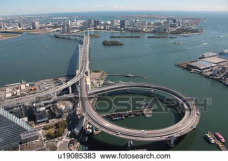 Stock Image - Aerial view of Rainbow bridge, Minato ward, Tokyo Prefecture, Honshu, Japan. Fotosearch