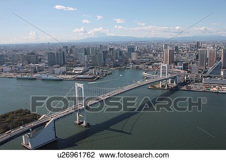 Stock Image - Aerial view of Rainbow bridge, Minato ward, Tokyo Prefecture, Honshu, Japan. Fotosearch