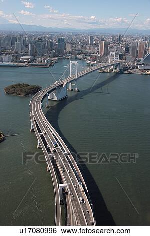 Stock Photograph - Aerial view of Rainbow bridge, Minato ward, Tokyo Prefecture, Honshu, Japan. Fotosearch